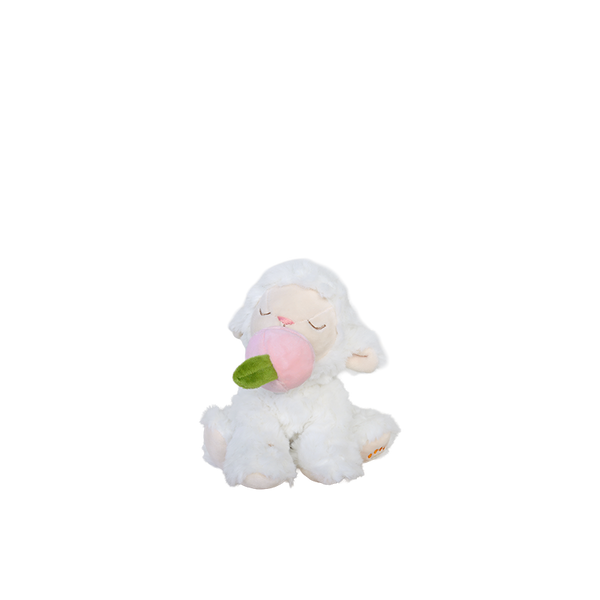 White plush toy sheep with a pink flower on a white background