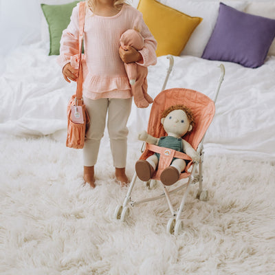 Olli Ella rose pink doll pram for kids toys. For use with our posable dinkum dolls and matching changing bag and mat for imaginative doll play.