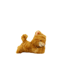 Plush toy lion lying down on a white background