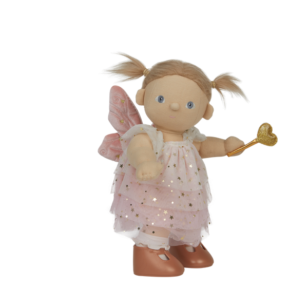 doll wearing white and gold fairy costume