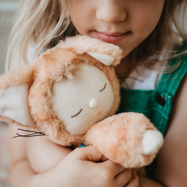 Little girl loves her ginger tabby cat, soft plush toy dinkum doll for kids