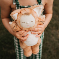 Little girl loves her ginger tabby cat, soft plush toy dinkum doll for kids