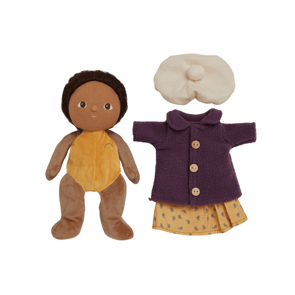 Stuffed doll with a coat and headband on a white background