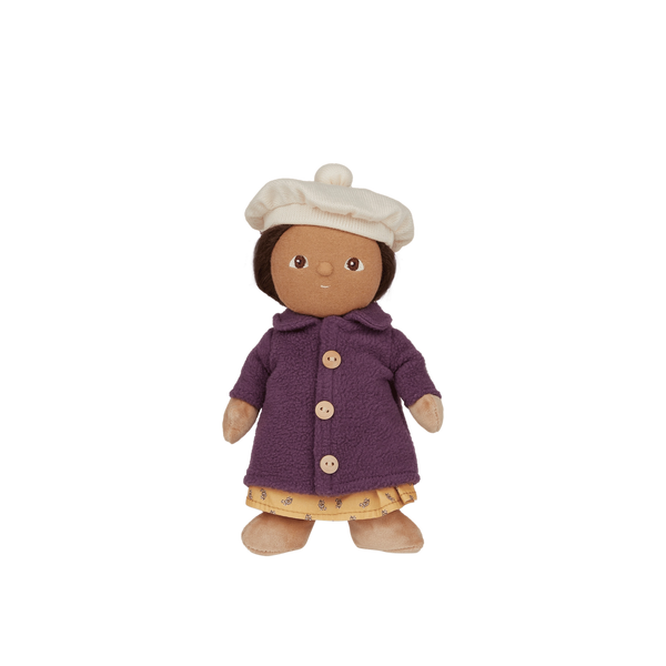 Toy doll with a purple coat and white hat on a white background
