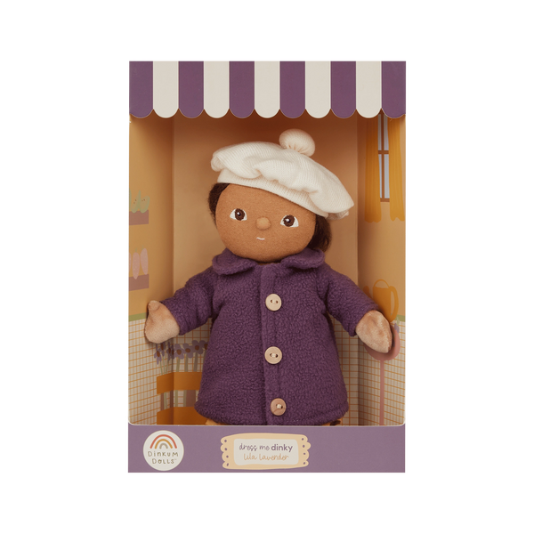 Doll in a purple coat and white hat in packaging with striped awning