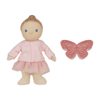Doll in pink outfit with a butterfly toy on a white background