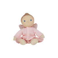 Stuffed toy baby doll in a pink outfit with angel wings on a white background