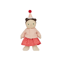 Stuffed doll with pink outfit and hat on a white background