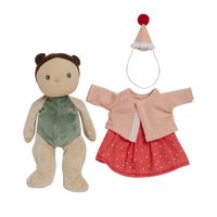 Stuffed toy with a green outfit and a separate pink sweater with a red hat on a white background