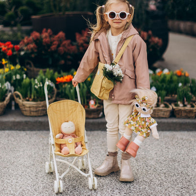 Olli Ella yellow doll pram for kids toys. For use with our posable dinkum dolls and matching changing bag and mat for imaginative doll play.