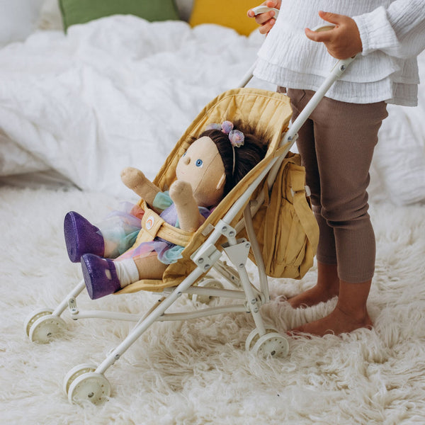 Olli Ella yellow doll pram for kids toys. Play with our posable dinkum dolls and teddies for kids doll play.