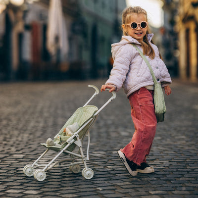 Olli Ella sage green doll pram for kids toys. For use with our posable dinkum dolls and matching changing bag and mat for imaginative doll play.