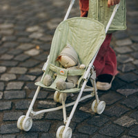 Olli Ella green doll pram for kids toys. Play with our posable dinkum dolls and teddies for kids doll play.